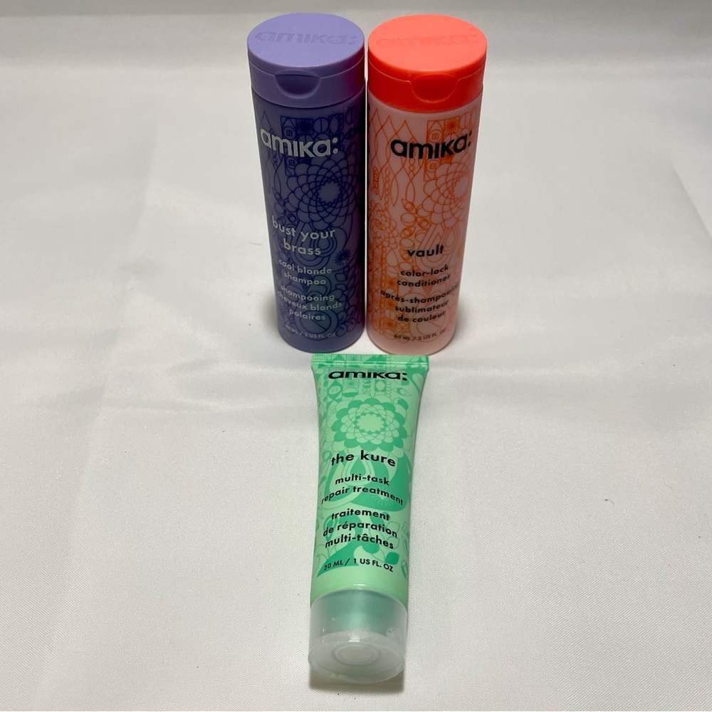 Amika Hair Care Set. Shampoo, Conditioner, and Repair Treatment.